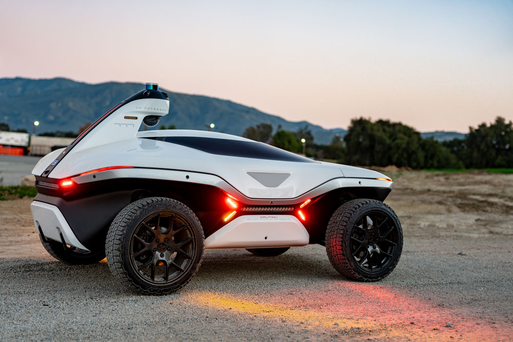 Side view with red lights of autonomous security robot K7